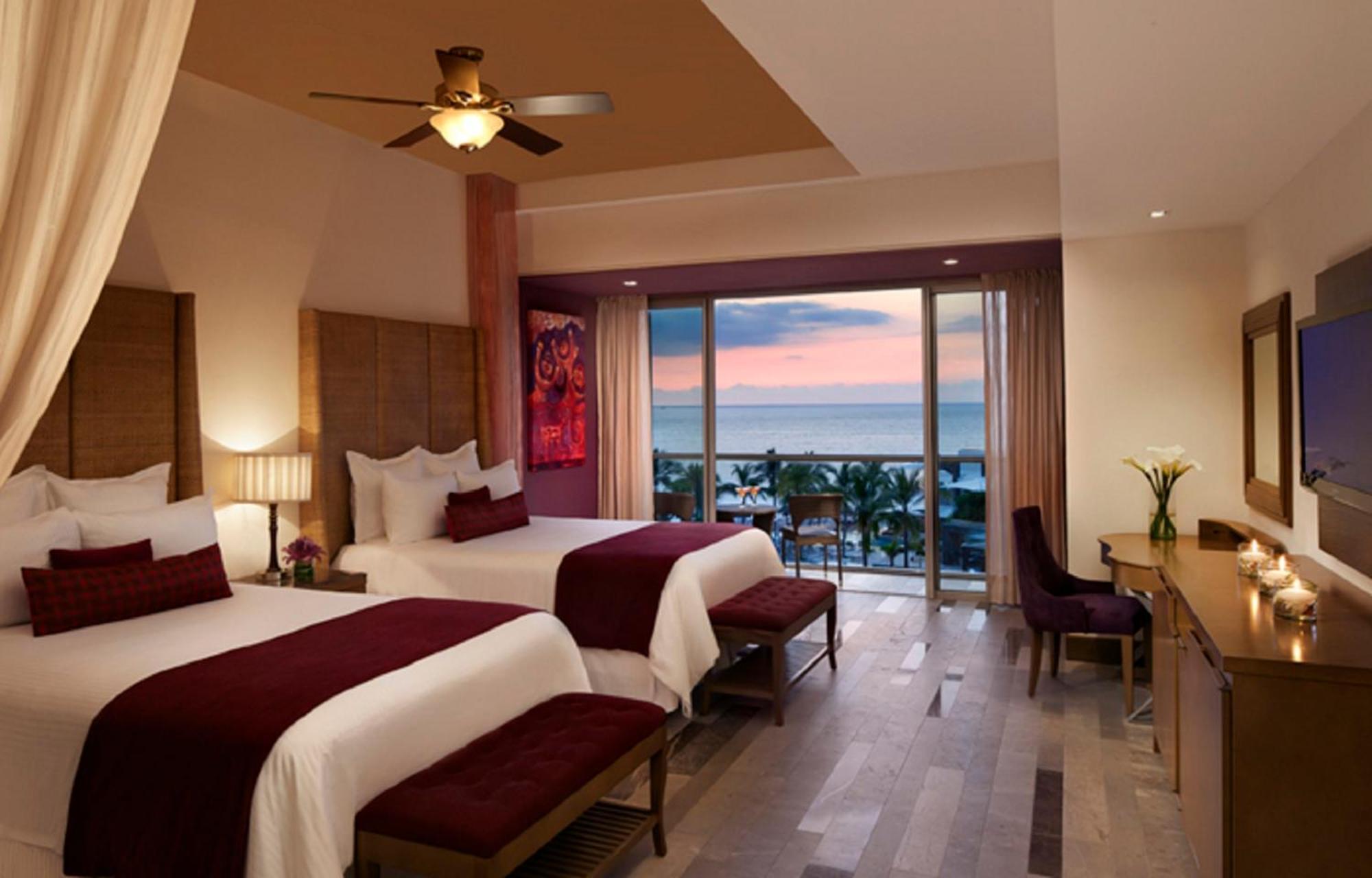 Junior Suite Two Double Beds Ocean View